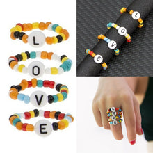 Load image into Gallery viewer, A set of 4 LOVE Letters Memory Wire Colourful Bead Stretch Rings Beaded Ring UK